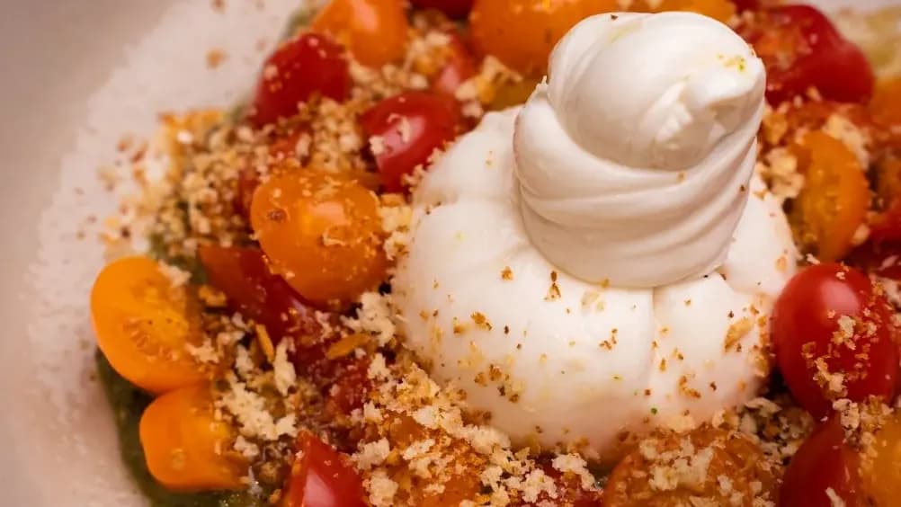 Vegetable salad with cherry tomatoes and burette cheese