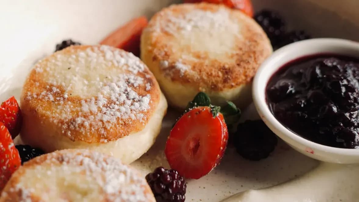 Syrniki with berry sauce