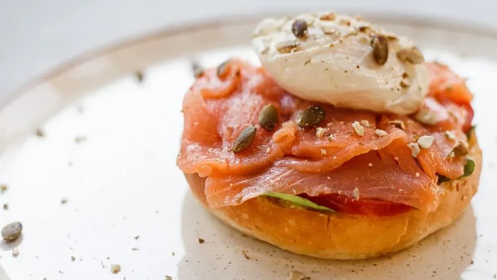 Sandwich with salmon and poached egg