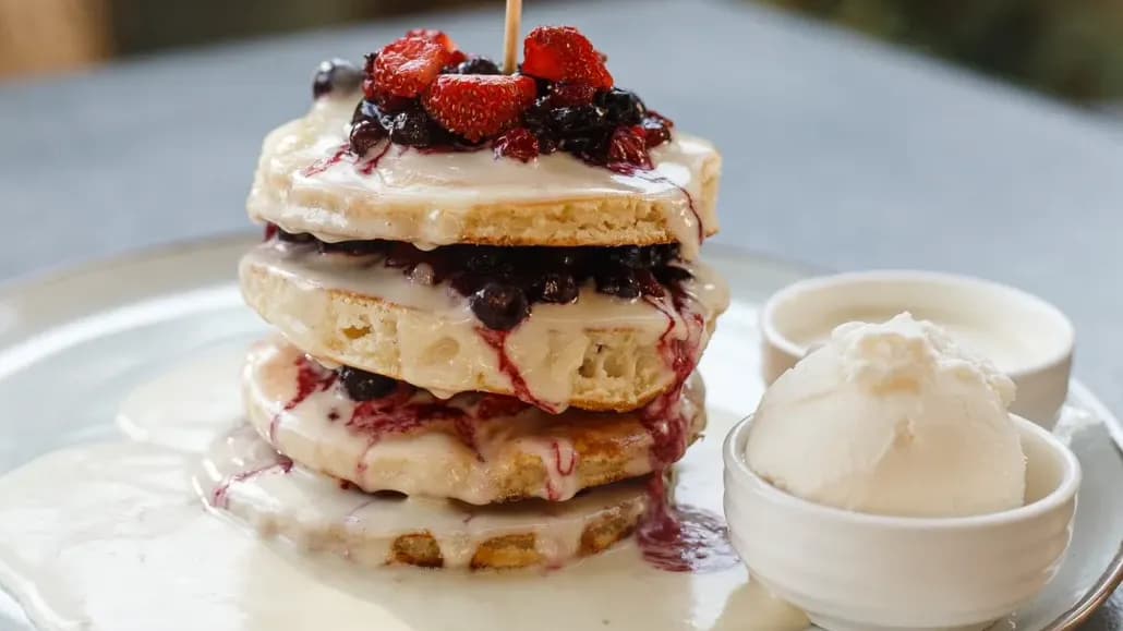 Pancakes with cream and berries