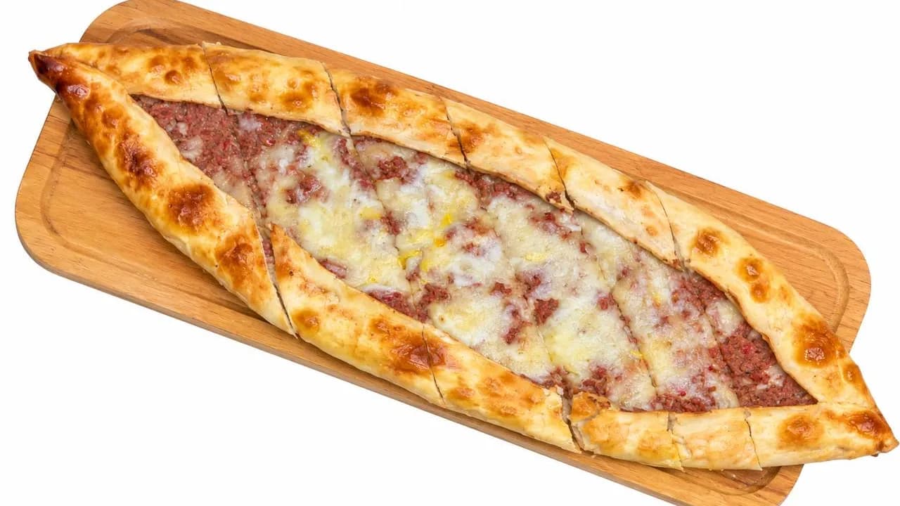 Pizza with minced meat and cheese